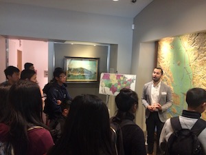 Students listening to a tour guide