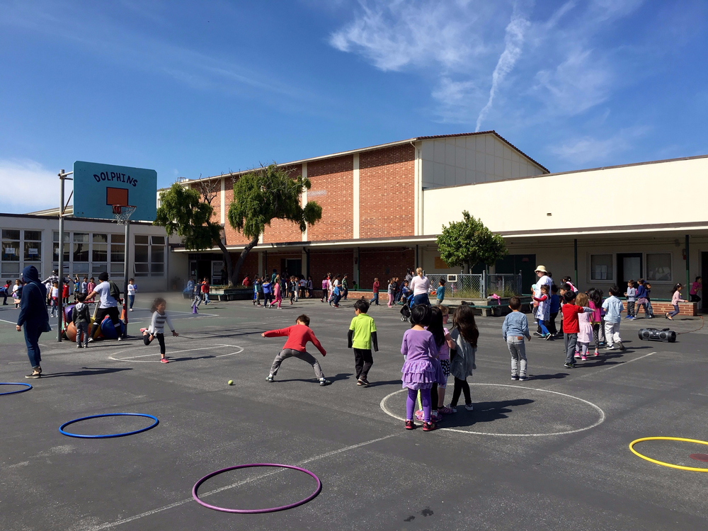 Elementary school students playing during recess