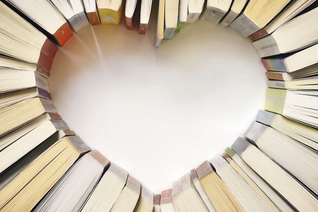Books arranged in a heart