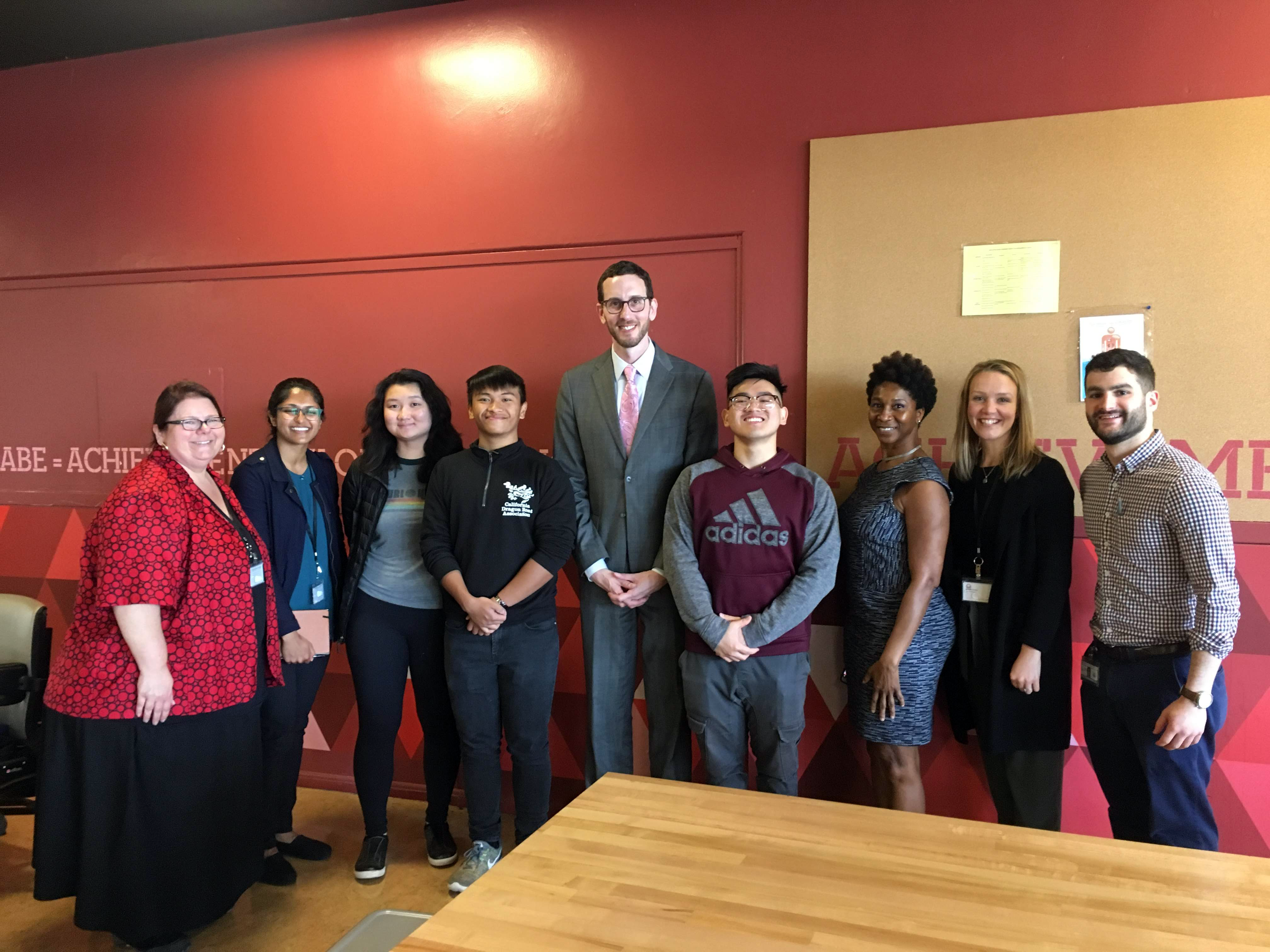 California State Senator Scott Wiener, center, joins Lincoln High School students for lunch, along with Student Nutrition Services staff and Executive Director Jennifer LeBarre, left