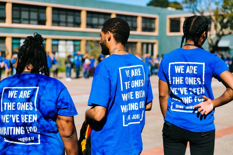 June Jordan staff wearing school shirts