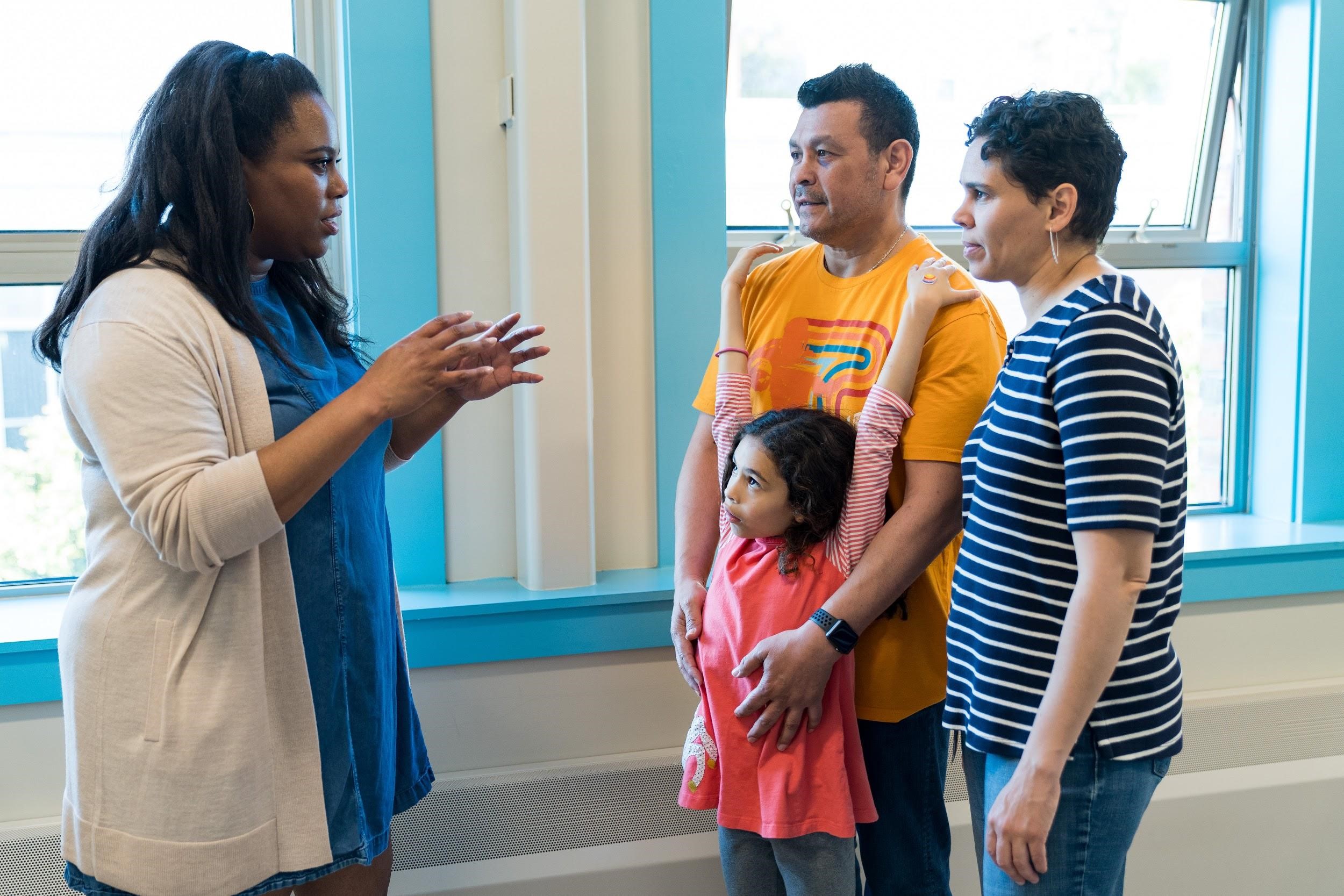 Educator talking to a family