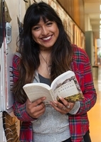 Smiling student with book