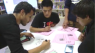 image of students writing on tables - visual thinking strategy