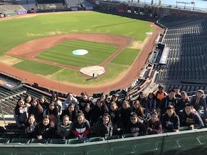 Students at a baseball park