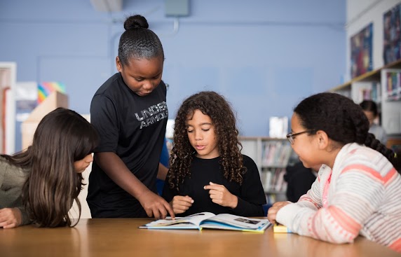 Students working together in the library