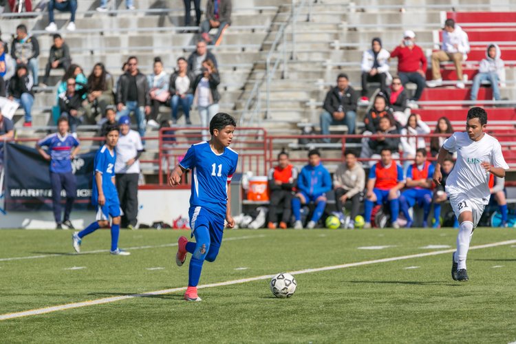 students playing soccer