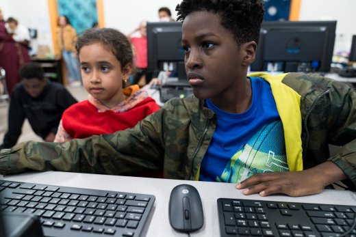 Two students at a computer