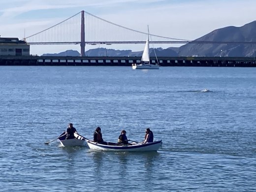 Downtown High School students row a boat in the Bay as part of their end-of-semester project for the Get Out and Learn program.