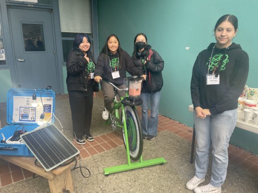 Students from Abraham Lincoln High School's Green Academy make smoothies on a bike.