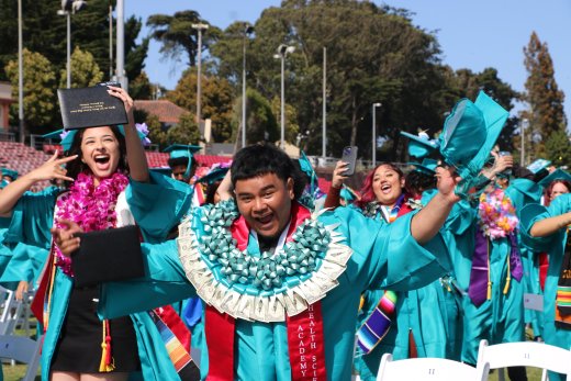 Student excited at high school graduation