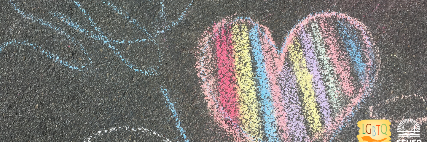 Rainbow Chalk Heart drawn on asphalt 