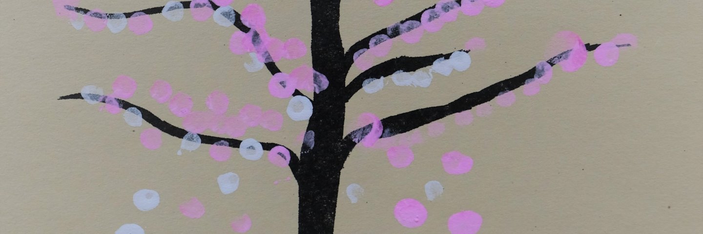 student painting of cherry blossom tree