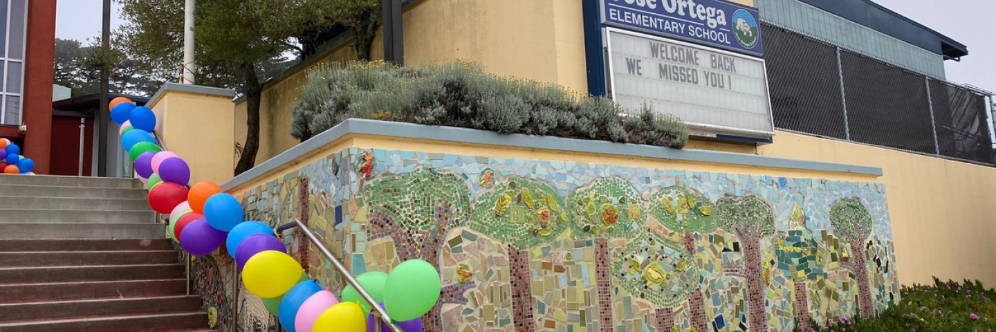 Exterior of Jose Ortega Elementary decorated with balloons