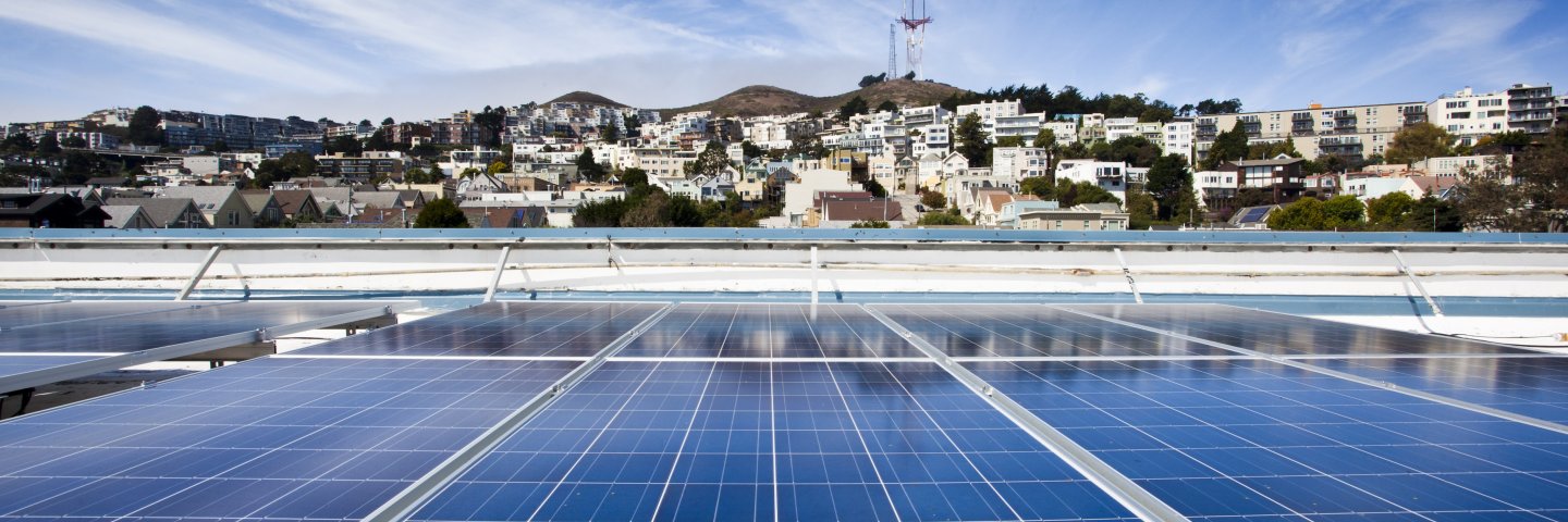 Solar panels with Twin Peaks in the background