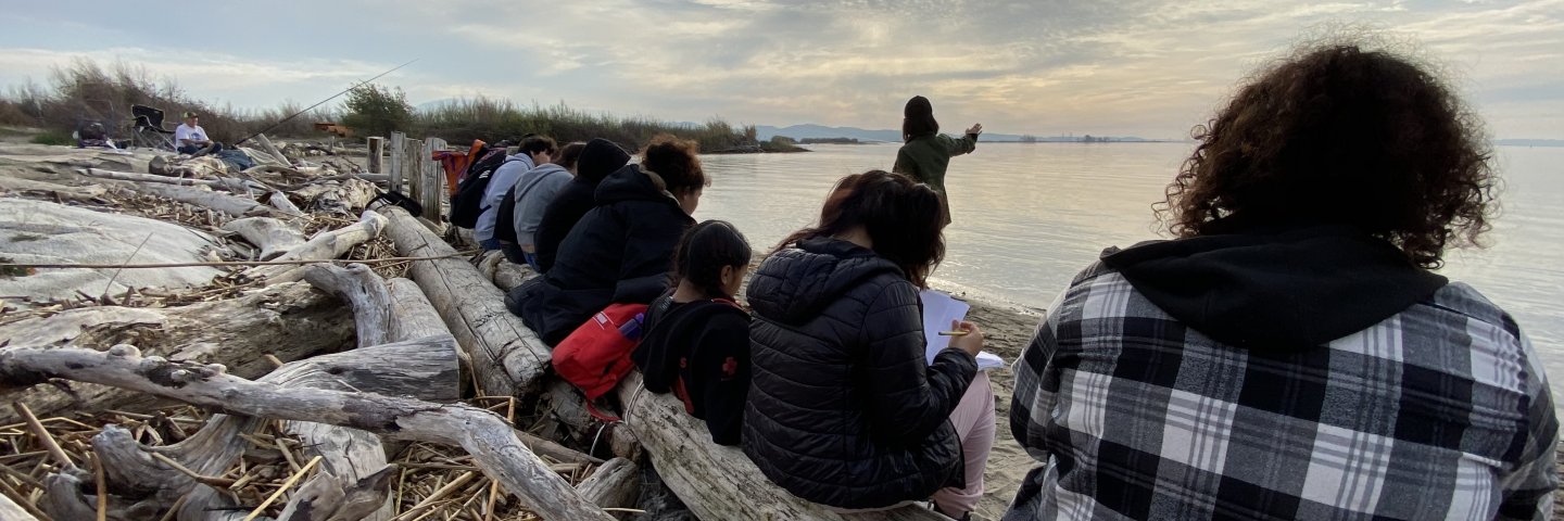 WALC students take notes on a fieldwork trip.