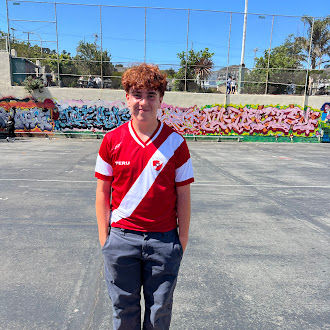 student wearing a Peru jersey to rep his culture