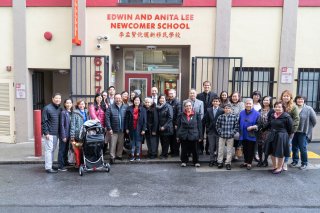 Mayor Ed Lee, Anita Lee, the Lee family, and friends at the front door of the school