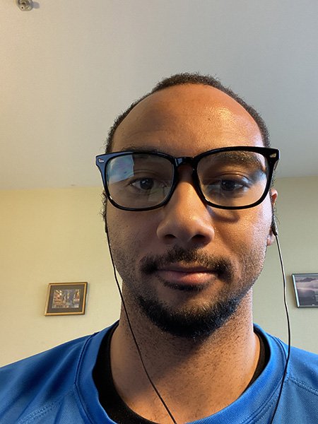 A picture of John Dixon, a teacher at A.P. Giannini Middle School, in his home during distance learning