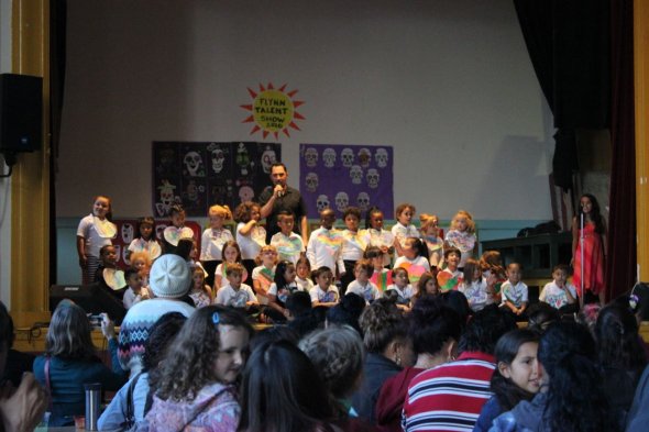 Students performing on stage