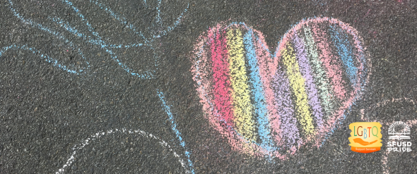 Rainbow Chalk Heart drawn on asphalt 