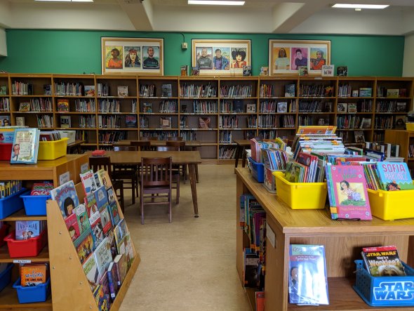 School library with bookshelves and decorations