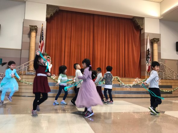 Kindergarten students dancing