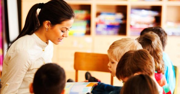 teacher reading to students