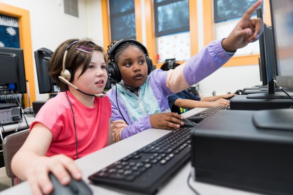 Students using desktop together