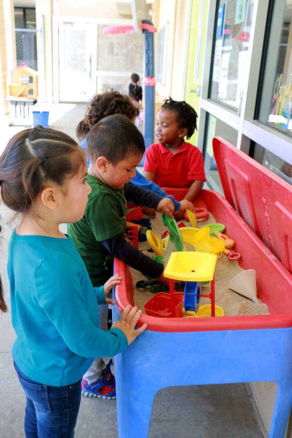 children playing at sensory table