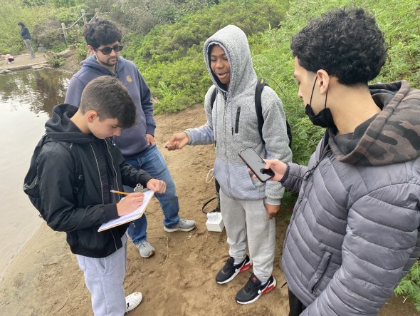 students on a field trip to the beach