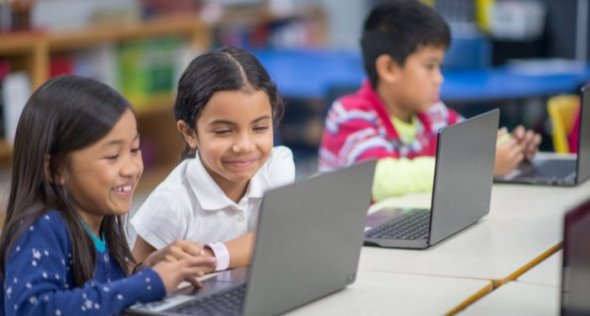 children using laptops