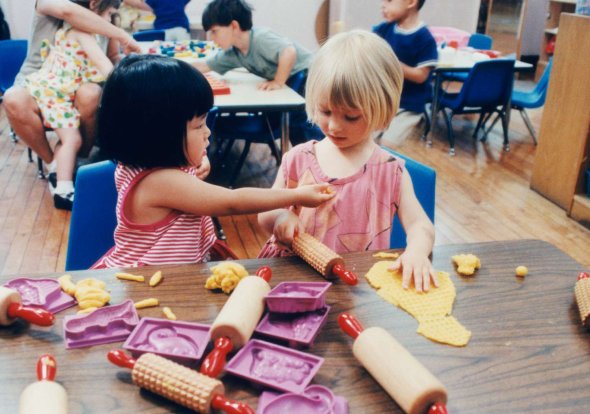 children playing with playdough