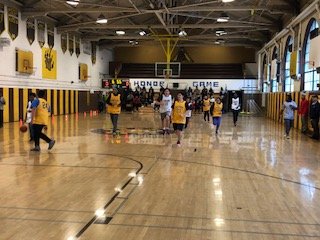 Students playing basketball during the Special Olympics 
