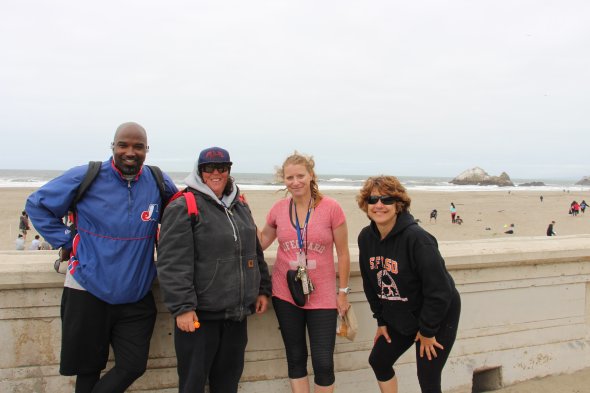 PE teachers at the ocean beach run 