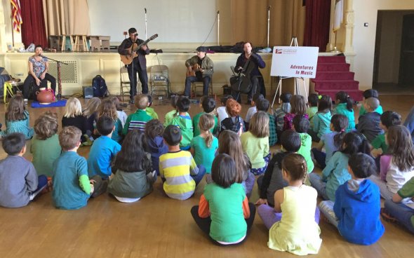 Musicians perform for students