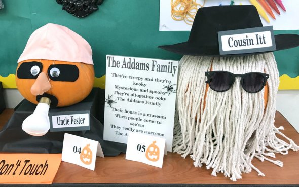 Pumpkins decorated as Addams Family characters 