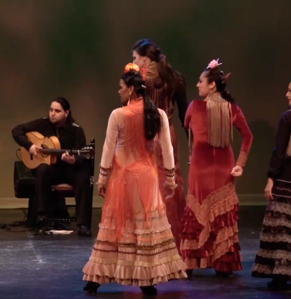 Three female Flamenco dancers and one male guitarist