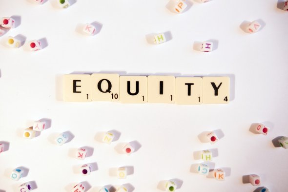 Building blocks that spell out "Equity"