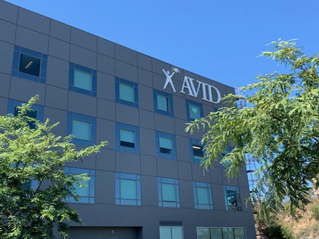 building with AVID on the side