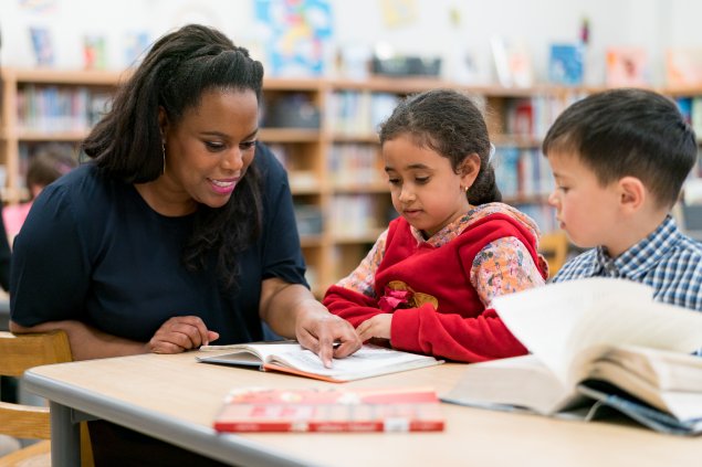 adult speaking with children