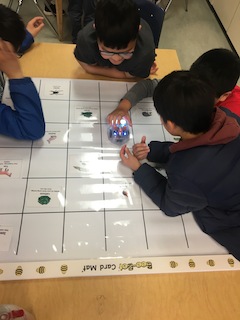 Students code a small robot together