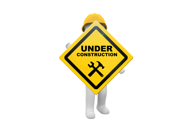 Figure with under construction sign
