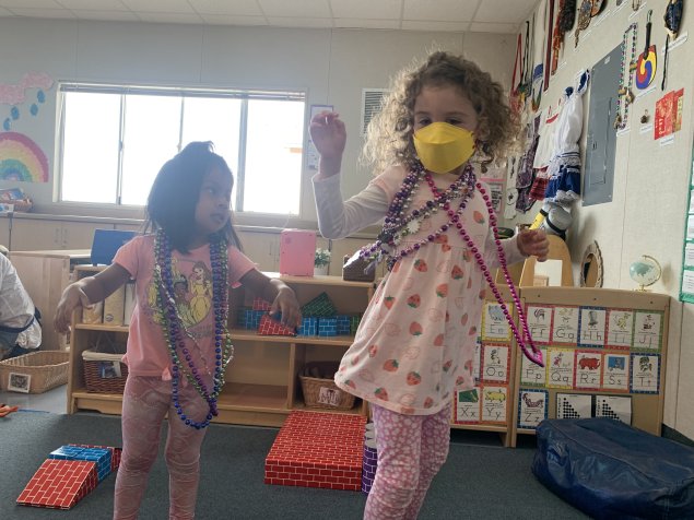 children dancing in classroom