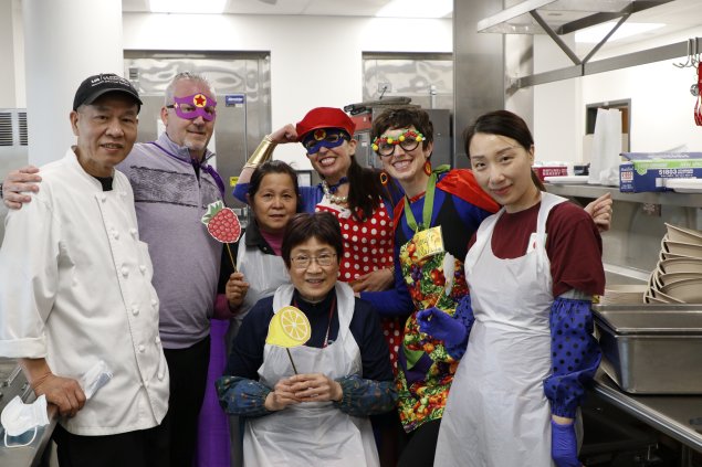 Dining Staff group photo in the kitchen.