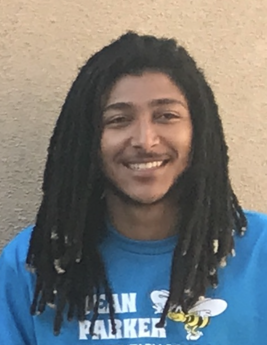 Smiling man with dreads