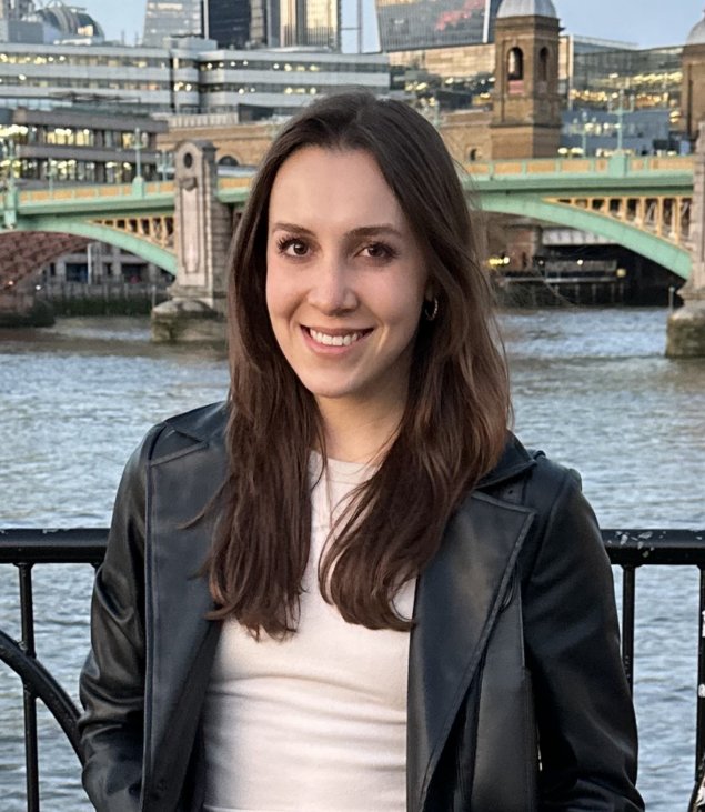 Smiling woman with long brown hair