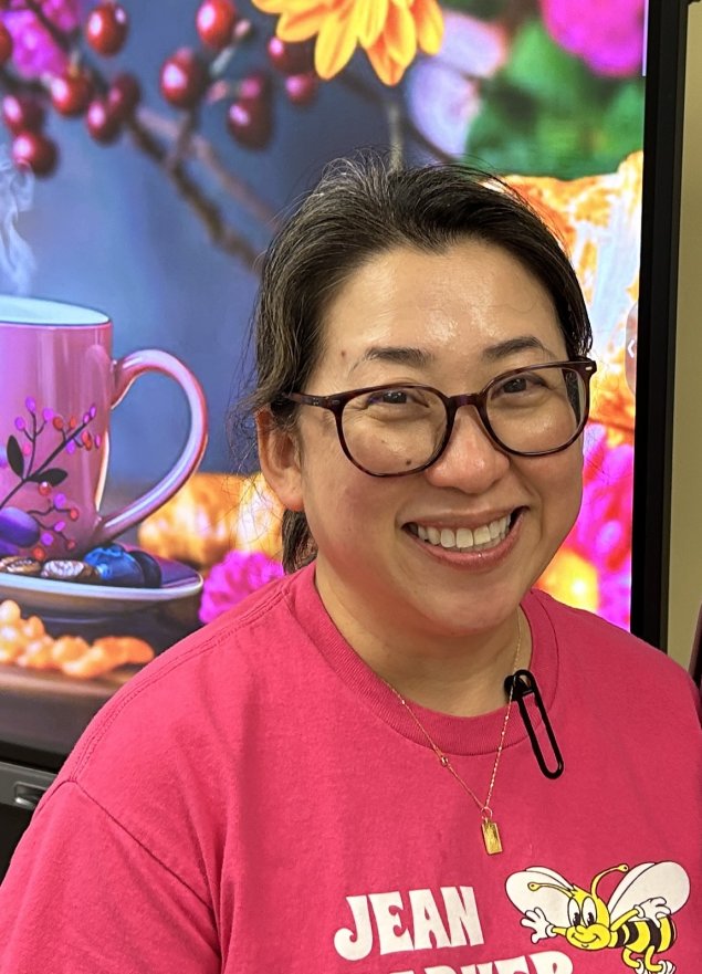 Smiling asian woman with brown hair