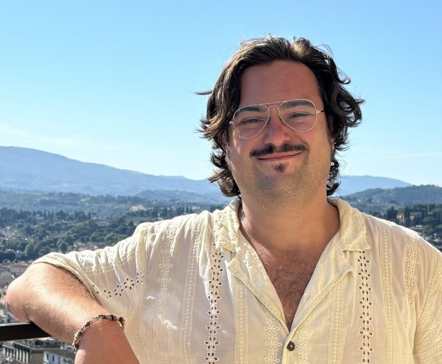 Smiling white man with brown hair