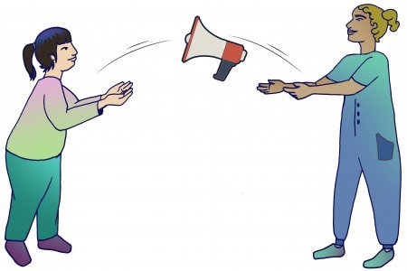 Two people sharing a megaphone